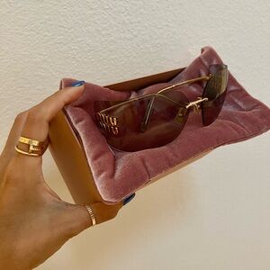 Miu Miu gold and light gray sunnies